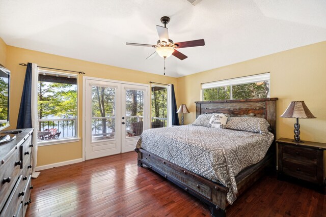 bedroom with access to outside, dark hardwood / wood-style floors, and ceiling fan