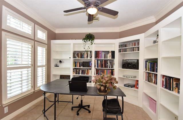 office space with ceiling fan, crown molding, light tile patterned floors, and built in features