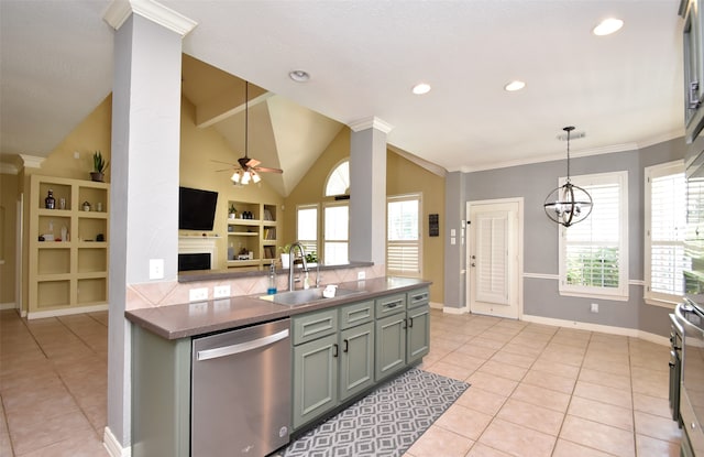 kitchen featuring dishwasher, lofted ceiling, sink, and a healthy amount of sunlight