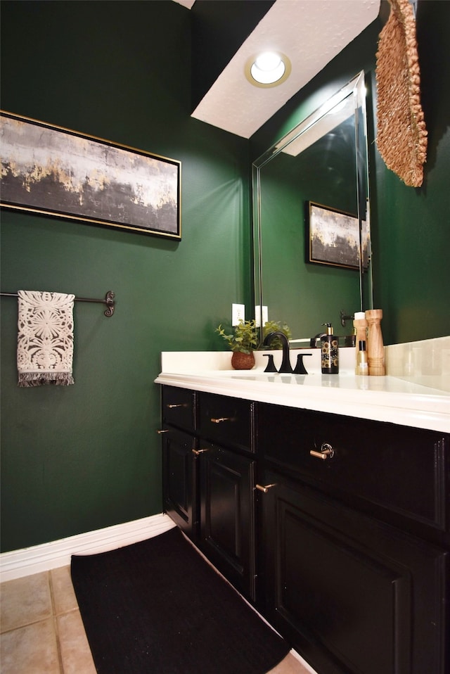 bathroom featuring vanity and tile patterned flooring