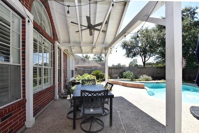 view of patio / terrace featuring ceiling fan and a fenced in pool