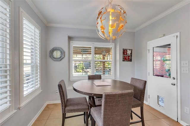 dining space with an inviting chandelier, ornamental molding, and light tile patterned flooring