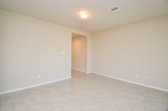 view of tiled spare room