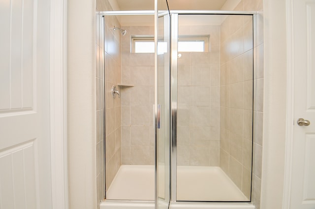 bathroom with an enclosed shower