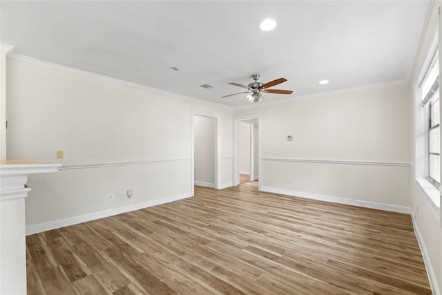 spare room with ornamental molding, ceiling fan, and light hardwood / wood-style flooring