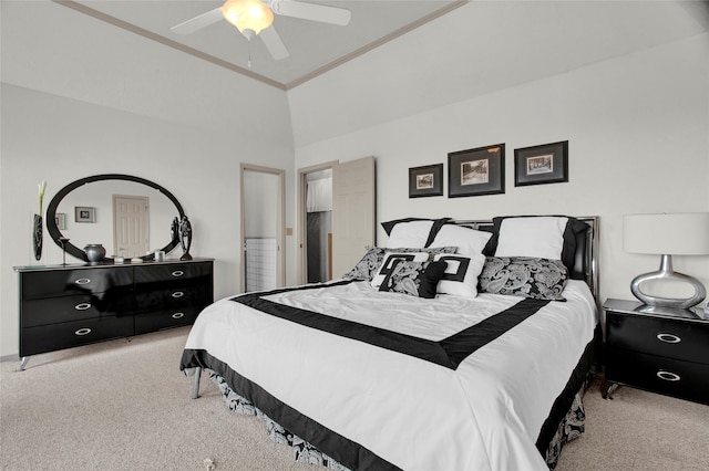 carpeted bedroom featuring crown molding, lofted ceiling, and ceiling fan