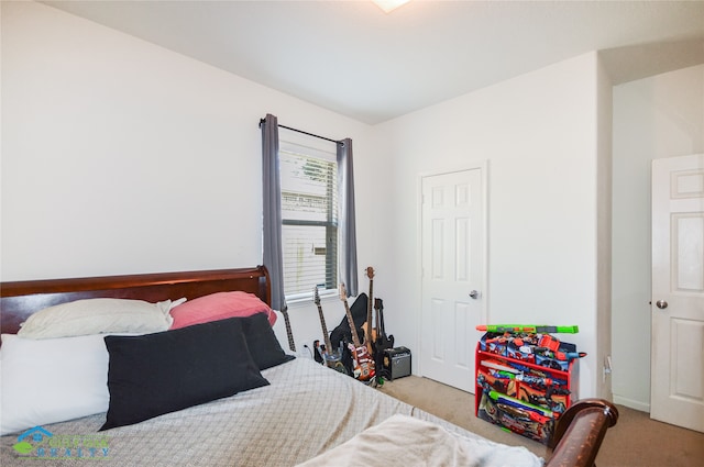 bedroom with light carpet