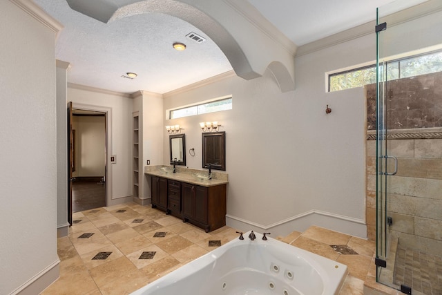 bathroom with built in shelves, vanity, separate shower and tub, and a wealth of natural light