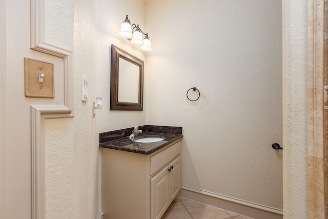 bathroom with vanity and tile patterned floors