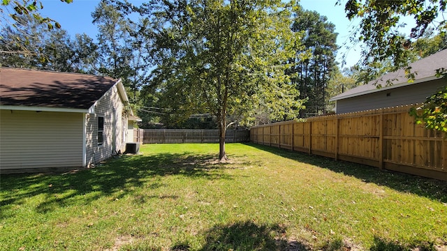 view of yard with central AC