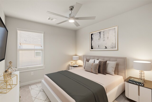 carpeted bedroom featuring ceiling fan