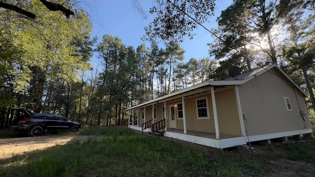 view of home's exterior with a porch