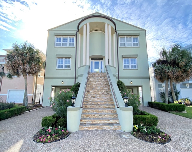 view of front of property with a garage