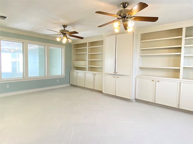 unfurnished living room with built in shelves, ornamental molding, and ceiling fan