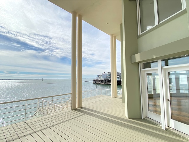 deck featuring a water view