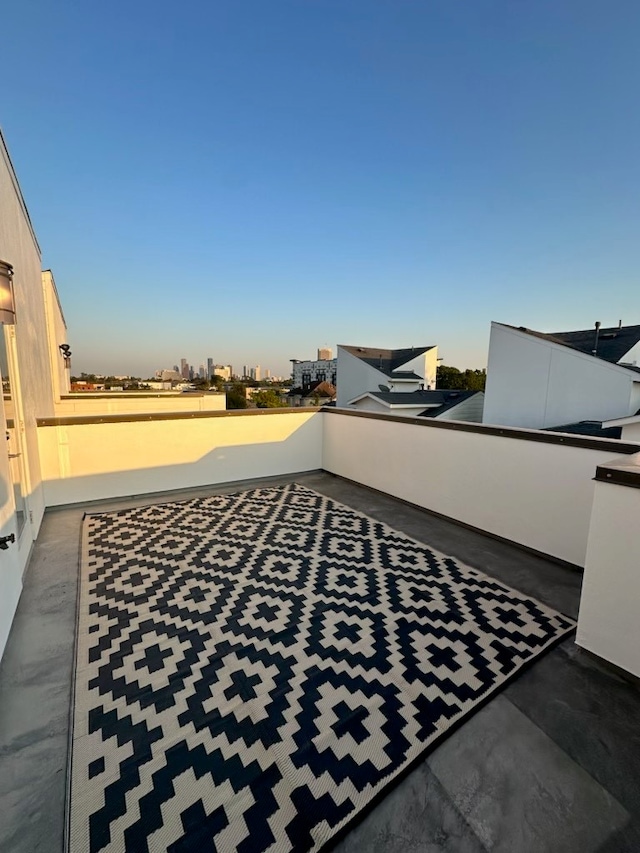 view of patio with a balcony