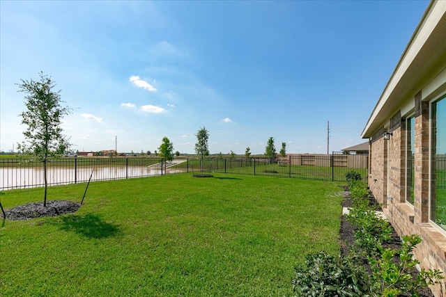 view of yard featuring a water view