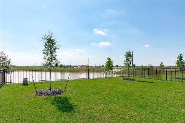 view of yard with a water view