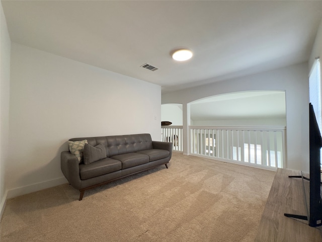 sitting room with light colored carpet