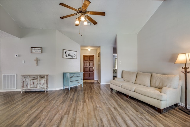 living room featuring hardwood / wood-style floors, ceiling fan, and high vaulted ceiling