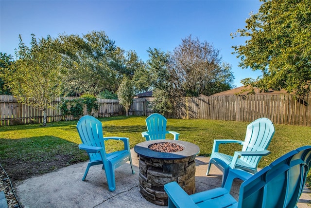 view of patio / terrace with an outdoor fire pit