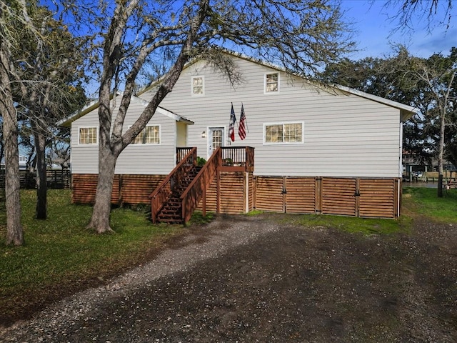 view of front of house featuring stairs