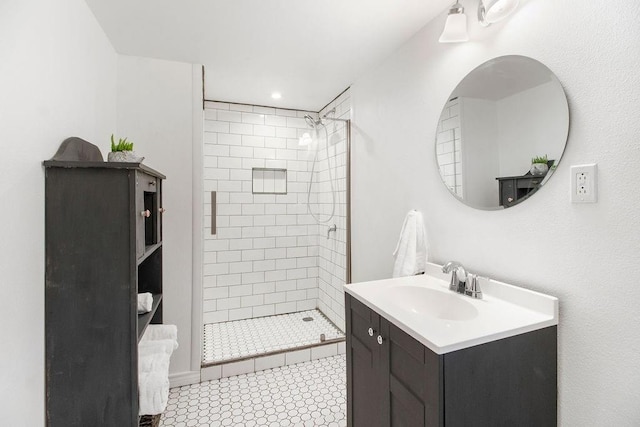 bathroom with vanity and a stall shower