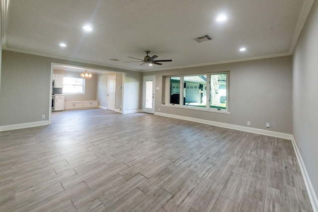 unfurnished living room featuring light wood-type flooring, visible vents, baseboards, and ceiling fan with notable chandelier