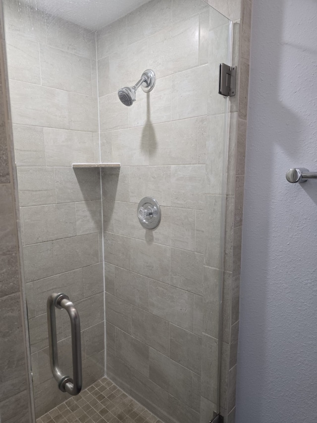 bathroom with an enclosed shower