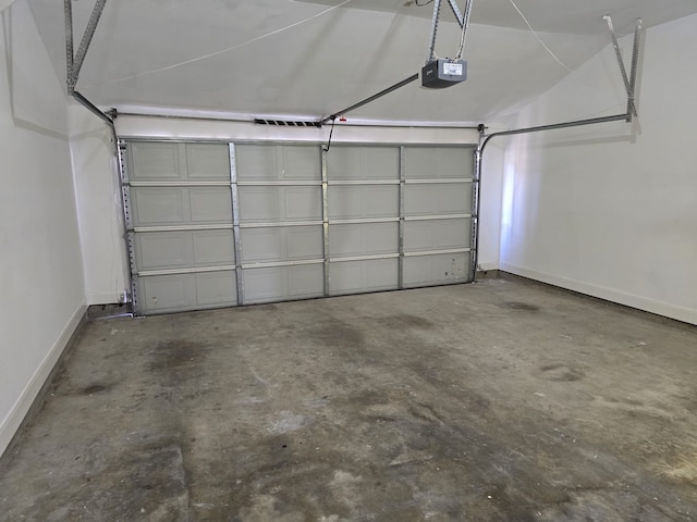 garage featuring a garage door opener