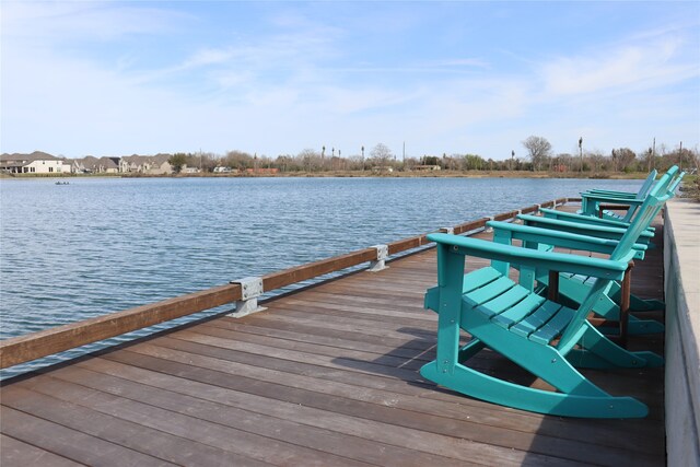 view of dock with a water view