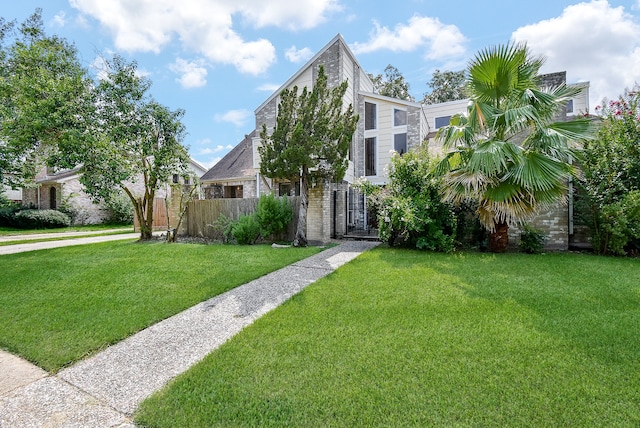 view of front of home with a front lawn