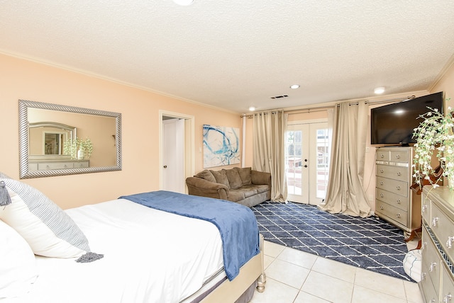 bedroom with light tile patterned floors, a textured ceiling, french doors, access to outside, and ornamental molding