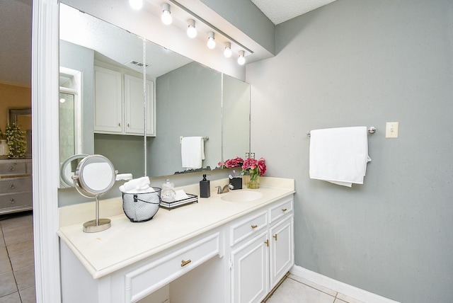 10726 Paulwood Dr, Houston, TX 77071 - bathroom featuring tile patterned floors, vanity, and baseboards
