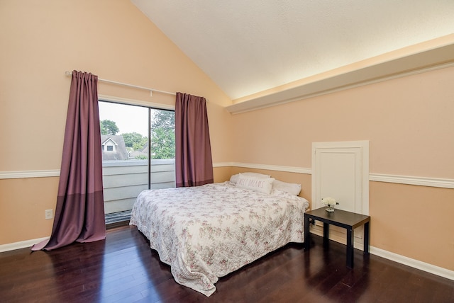 bedroom with wood-type flooring and high vaulted ceiling