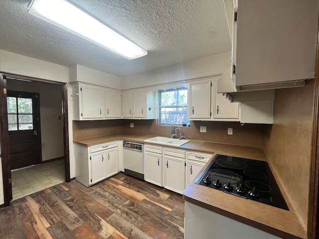 kitchen with white cabinetry, dark wood-type flooring, sink, dishwasher, and black electric stovetop