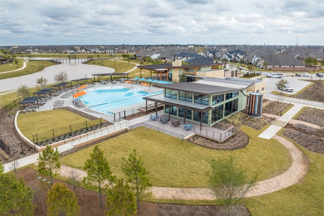 drone / aerial view with a water view