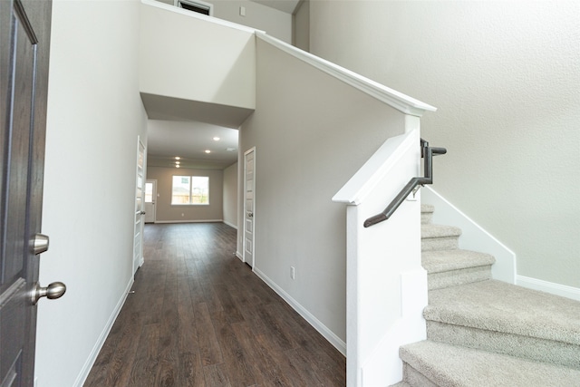 foyer with dark hardwood / wood-style flooring