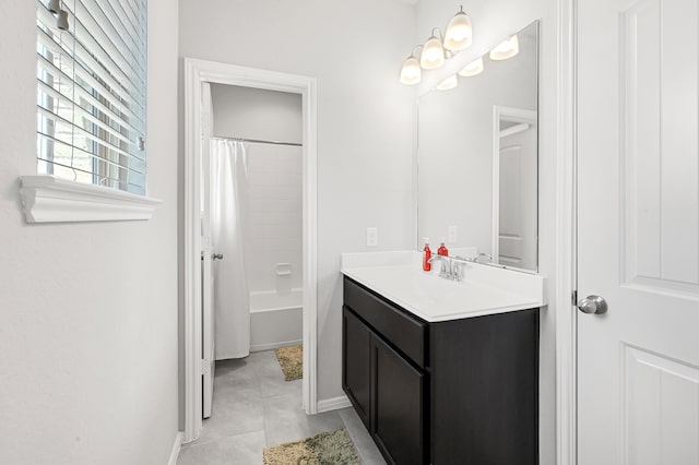 bathroom featuring shower / bath combination with curtain, tile patterned floors, and vanity