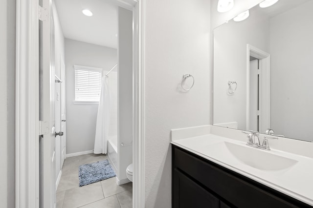 full bathroom with shower / tub combo with curtain, vanity, toilet, and tile patterned flooring