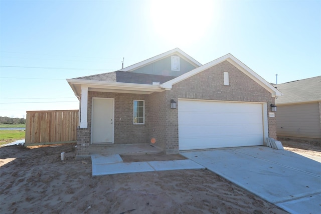 single story home with a garage