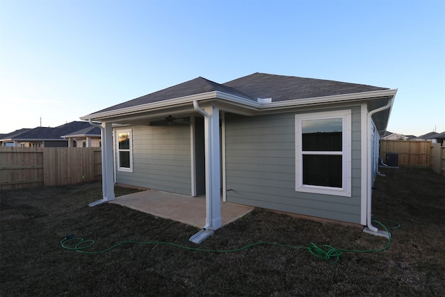 back of house featuring ceiling fan, central AC, and a patio