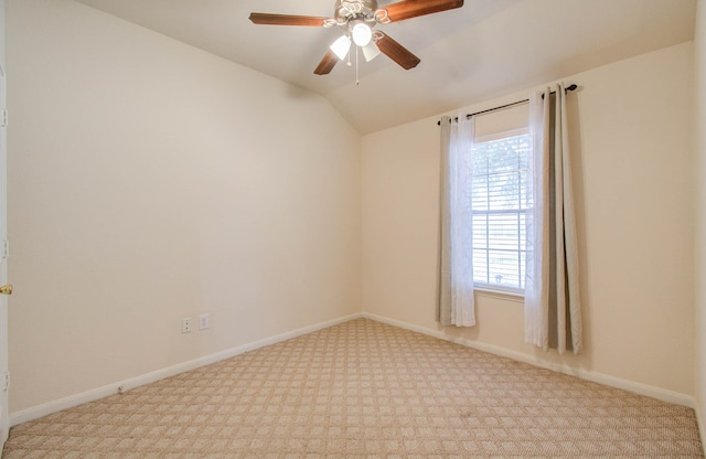 empty room with light carpet, lofted ceiling, and ceiling fan