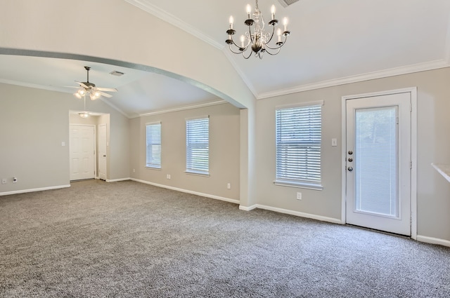 foyer featuring crown molding, vaulted ceiling, and carpet