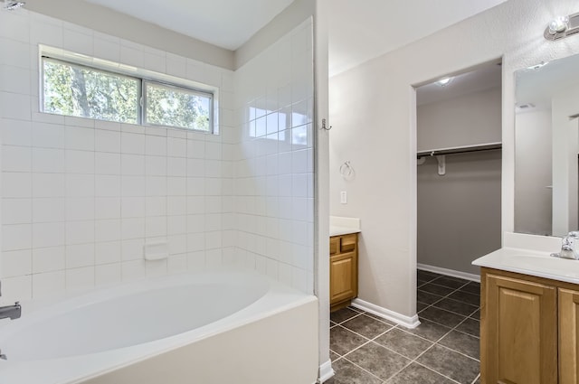 bathroom with tile patterned flooring and vanity