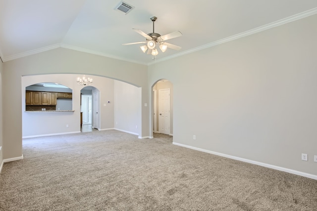 spare room featuring light colored carpet, lofted ceiling, and ornamental molding