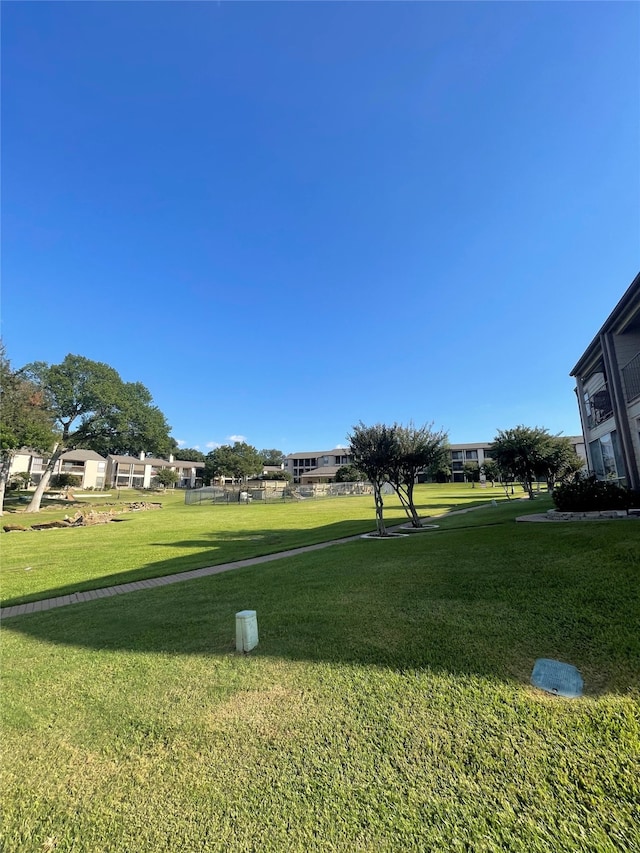 view of community with a lawn