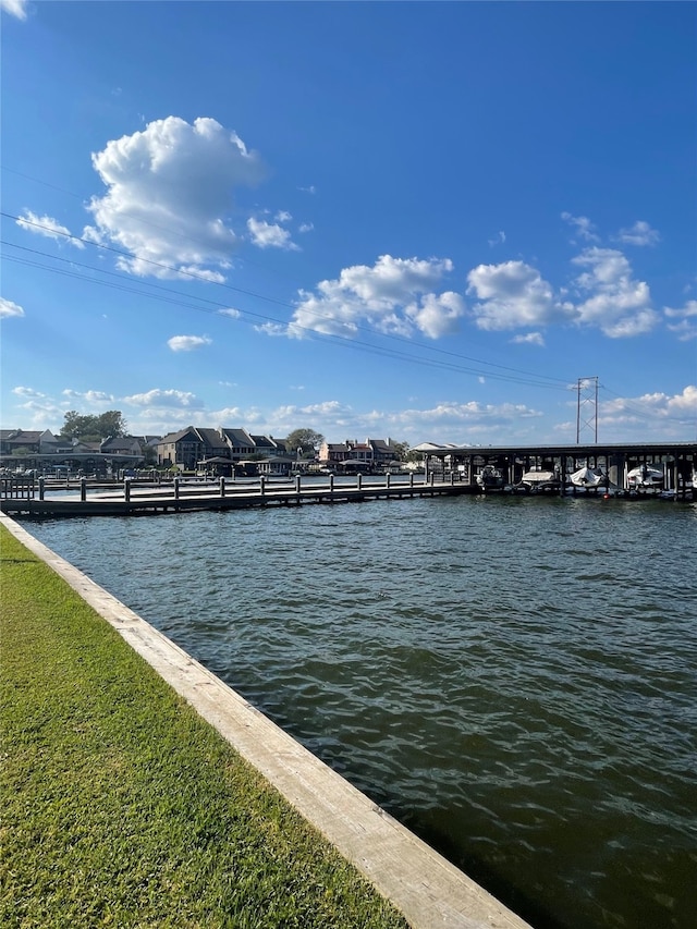 view of dock with a water view