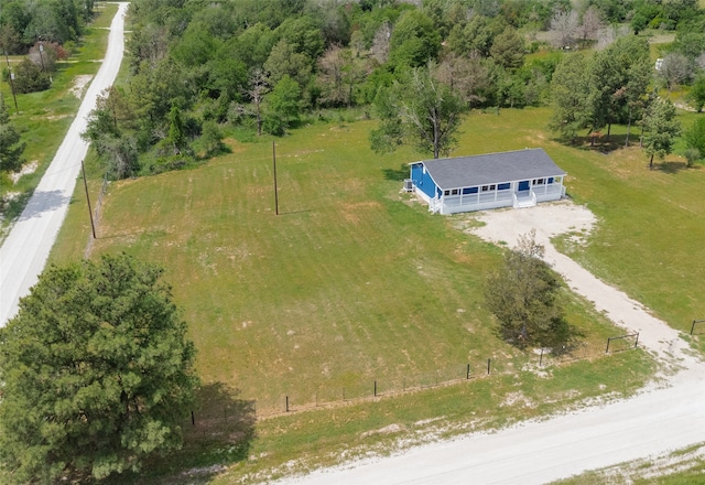 birds eye view of property with a rural view