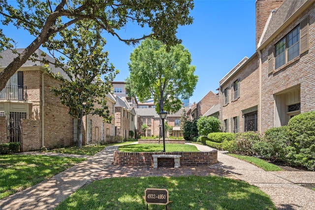 view of community with a lawn